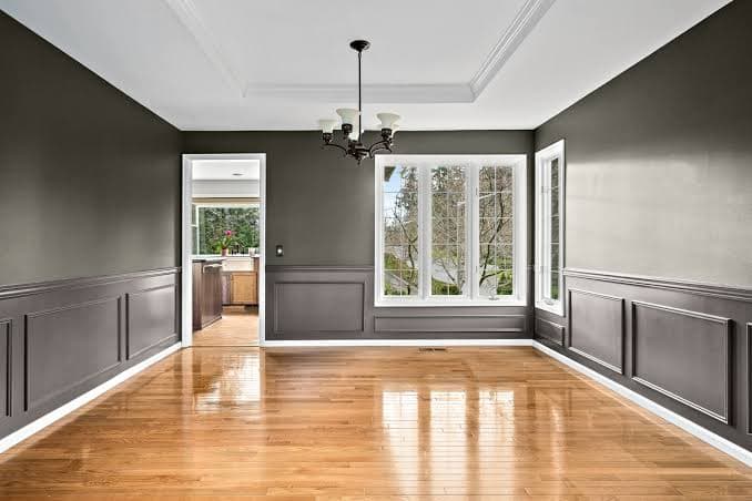 A finished interior dining room with a fresh coat of paint